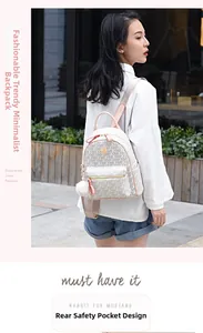 Detail view of cream patterned backpack featuring a secure back anti-theft pocket design