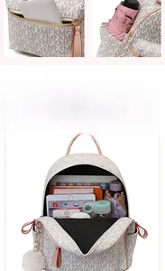 Detail view of large capacity backpack interior showing iPad, umbrella, and daily items
