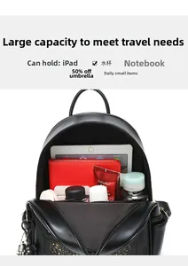 Large capacity black PU backpack interior showing space for iPad, umbrella and notebook