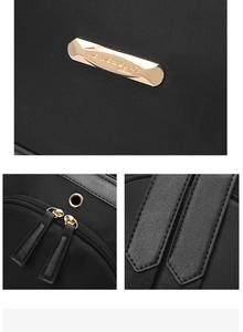 Détails d'un sac à dos noir en nylon avec finitions dorées et sortie pour écouteurs