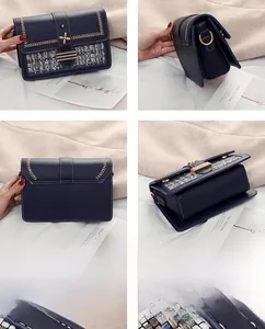 Dettaglio della borsa a tracolla blu scuro con trama intrecciata e fibbia in metallo vintage