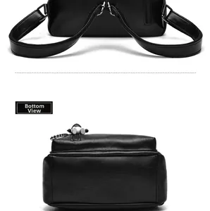 Detail view of black soft leather backpack showing rear zipper pocket and flat bottom base