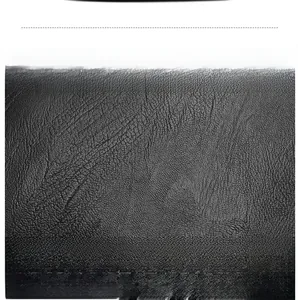 Close-up of black litchi texture leather showing soft and durable material details