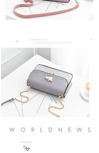Detail of pink sequin and grey cross-body bags with cat pearl charms and chain straps
