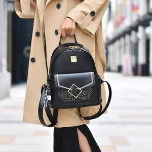 Fashionable black PU leather backpack with gold hardware and sequins for women