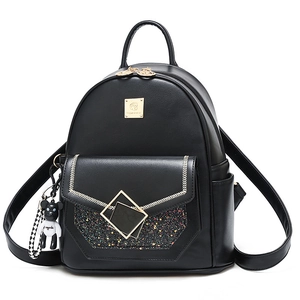 Elegant black leather backpack for women with golden panda plaque and bear charm accessory