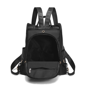 Sac à dos noir en nylon pour femme imperméable avec design antivol et détails dorés