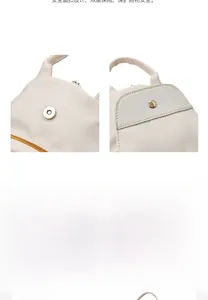 Detail view of the beige oxford backpack showing the magnetic snap closure and leather trim