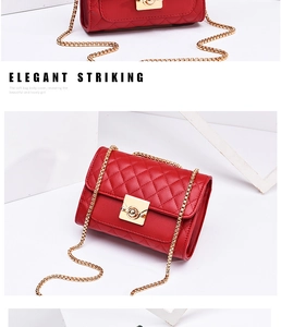 Close-up of red quilted leather bag with golden chain strap and twist-lock closure