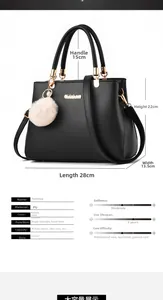 Detailed size chart for black PU handbag showing 28cm length and pompom charm detail