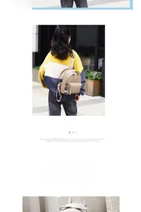 Detailed view of beige and white faux leather backpacks with cute bear charm accents
