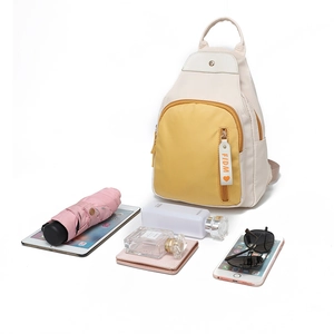 Minimalist cream Oxford fabric backpack and chest bag with organized essentials