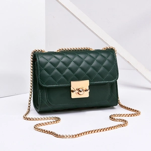 Elegant dark green quilted crossbody bag with golden chain strap and stylish square twist lock