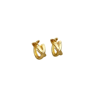Polished gold-plated criss-cross V-shaped hoop earrings on a clean white background