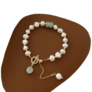 Elegant Baroque freshwater pearl bracelet with green gemstones and golden OT clasp