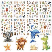 Detail of laser glitter marine animal stickers featuring watercolor elephant and dolphin
