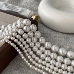 Elegant multi-layered white pearl necklace set with high-luster round beads on display