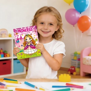 Smiling young girl holding a 48-page princess coloring book in a bright playroom
