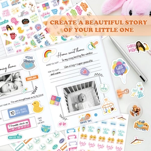 Detail view of baby milestone album showing stickers and photo journal pages