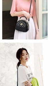 Detail of black quilted crossbody bag with gold M logo and double zipper closure