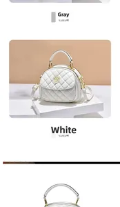 Detail view of quilted PU leather crossbody bags in gray and white with golden metal logo