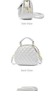 Detail view of white quilted crossbody bag with gold hardware and dual zipper compartments