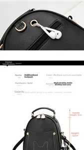 Detail view of black faux leather backpack with headphone port and cat ear stitching