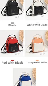 Detailed view of mini textured leather backpacks with cat ear stitching and bear charms