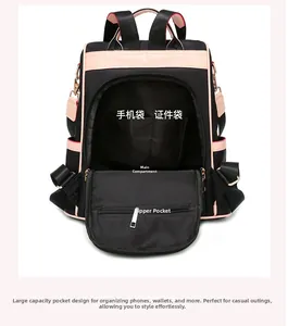 Detail view of Oxford backpack interior with phone slot, ID pocket and large main compartment