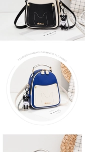 Detail of mini backpack featuring cat-ear stitching and a cute bear keychain accessory