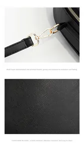 Detail of multi-layer electroplated gold clasp and scratch-resistant PU leather texture