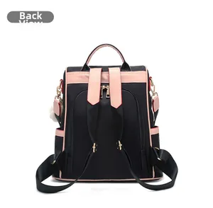 Detail of waterproof Oxford backpack with anti-theft back zipper and cute plush ball