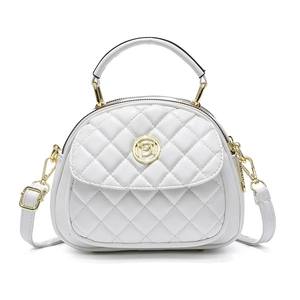 White quilted shoulder bag with gold logo, elegant chain strap and curved handle design