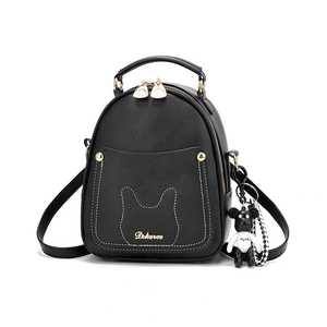 Black mini backpack with white ear stitching and bear pendant for women