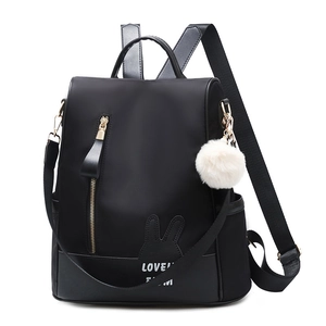 Fashionable black oxford nylon backpack for women with bunny ears and plush ball pendant