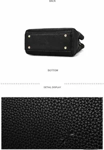 Détail du fond de sac en cuir grainé noir avec quatre clous de protection dorés