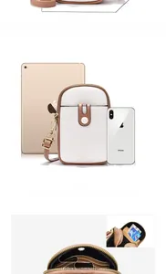 Detailed view of bicolor crossbody phone bag showing internal card slots and compartments