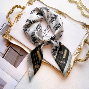 Elegant silk-like square scarf featuring horse carriage print and golden buckle patterns