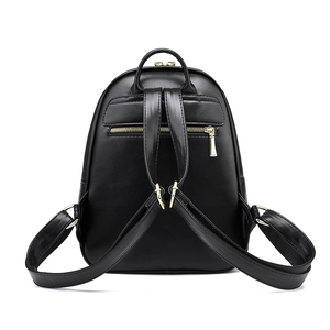 Rear view of black lychee grain leather backpack with adjustable straps and gold hardware