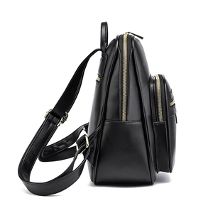 Minimalist black soft leather backpack for women with gold zippers and side pockets