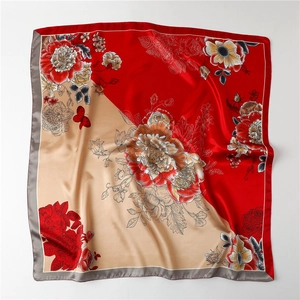 Satin silk scarf featuring a red and champagne peony floral print in a 90cm square design