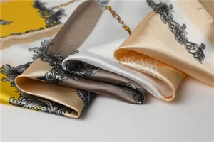 Detailed view of the baroque pattern and silk texture on the 90x90cm square scarf