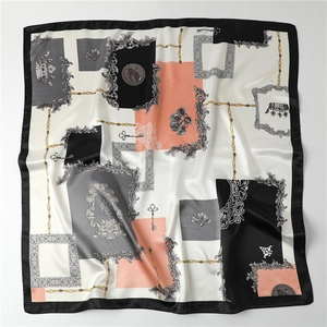 Detailed pattern of a 90x90cm satin square scarf with baroque chain and key motifs