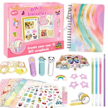 Pink DIY journal gift set for girls featuring stickers, colorful pens, and scrapbooking tools