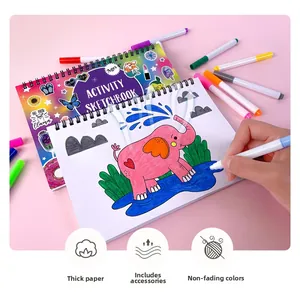 Detailed view of the kids activity sketchbook with colorful markers and cartoon patterns