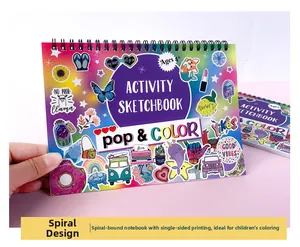 Macro view of wire-bound activity sketchbook with colorful cartoon stickers for kids aged 4+