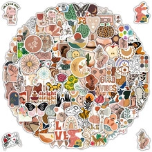 Detailed view of bohemian stickers featuring flowers and rainbows for luggage and bottles
