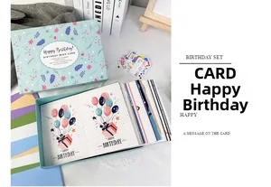 Detail of DIY birthday card set with colorful envelopes and floral storage box