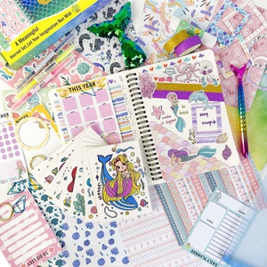 DIY mermaid themed journal stationery set with notebook stickers and mermaid tail pen
