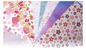Set of 10 decorative scrapbooking background papers with floral and geometric patterns